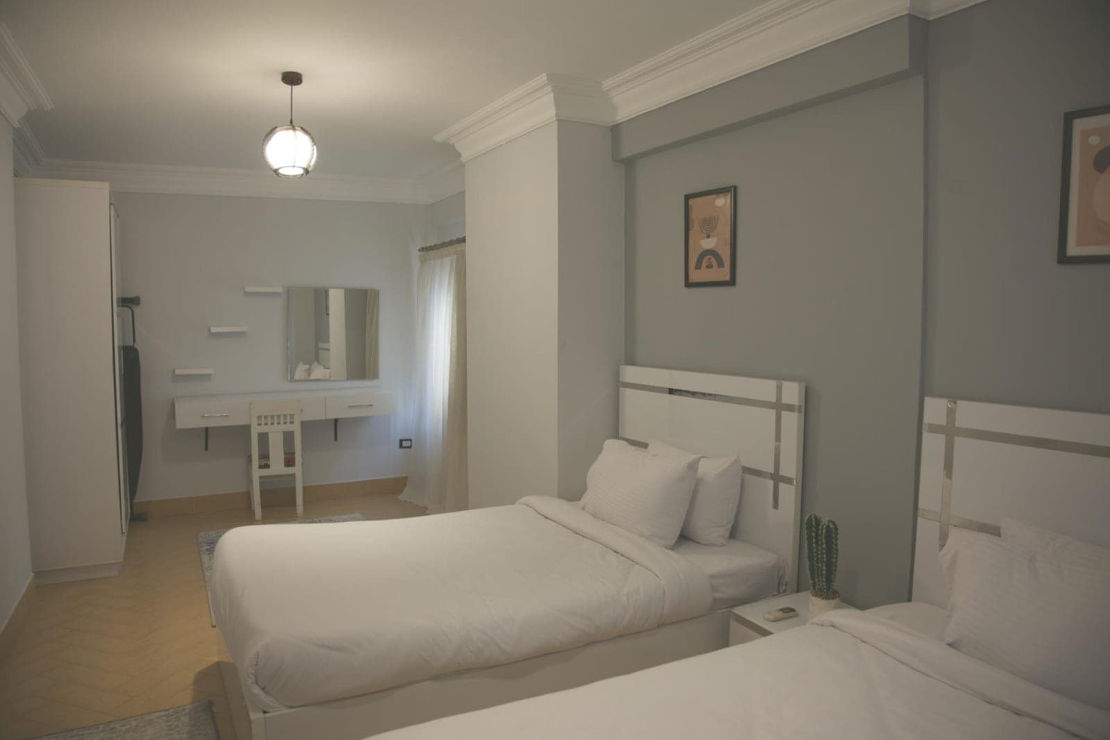 A bedroom in Suite 5, Zamalek Suites